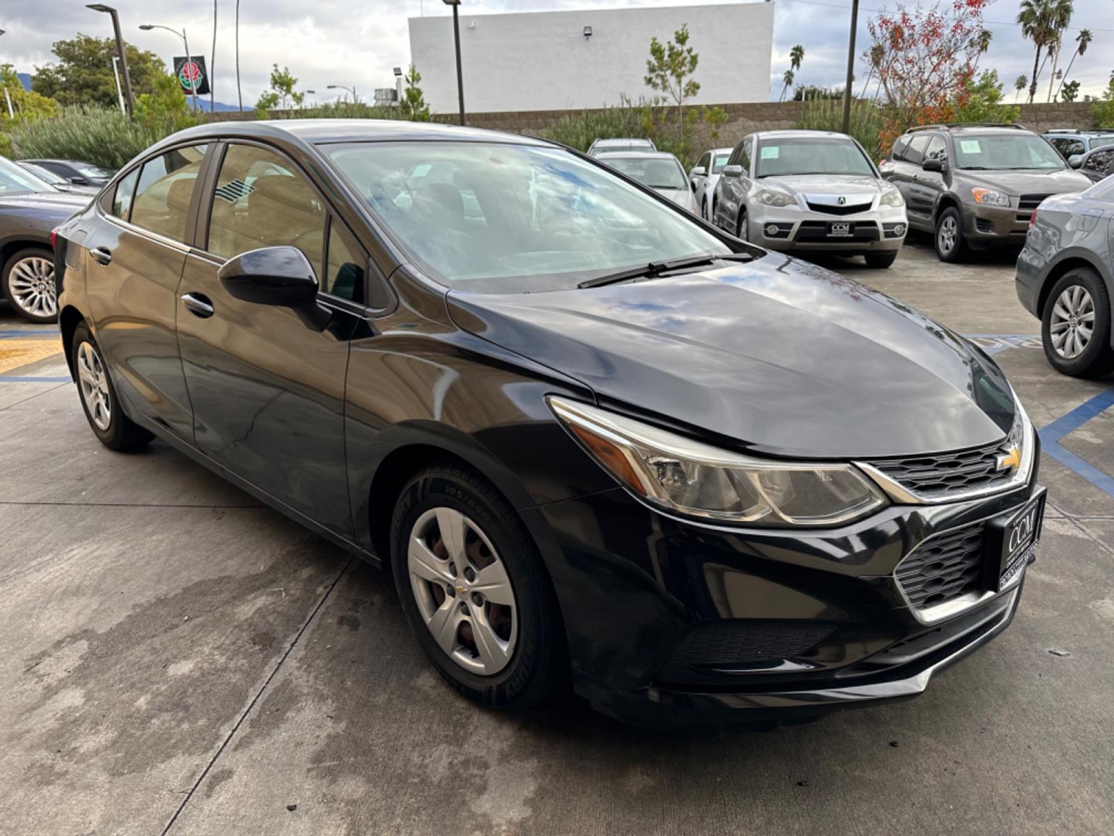 2017 Black /BLACK Chevrolet Cruze LS Auto (1G1BC5SM6H7) with an 1.4L L4 DOHC 16V TURBO engine, 6A transmission, located at 30 S. Berkeley Avenue, Pasadena, CA, 91107, (626) 248-7567, 34.145447, -118.109398 - Crown City Motors is a used “Buy Here Pay Here” car dealer in Pasadena CA. “Buy Here Pay Here” financing, means that when you purchase your vehicle from our dealership, that you make the payments to the dealership as well. We do not need the banks approval to get you approved for a used auto - Photo #6